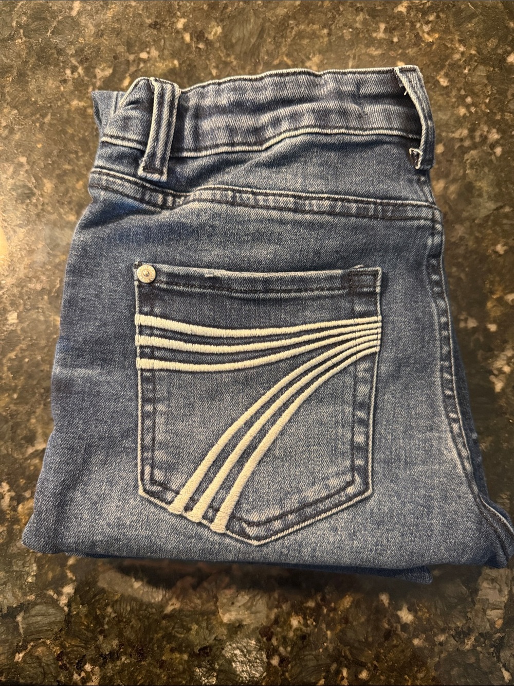 7 For All Mankind High-Rise Blue Denim Jeans with Curved Contrast Stitching